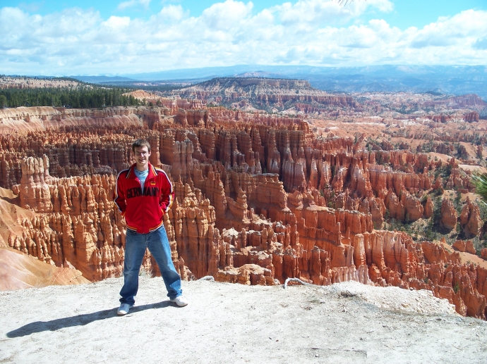 Me, standing in front of the Bryce Canyon amphitheater. The view is so stunning that a lot of people think the picture is photoshopped! 
 By: Neal Grosskopf
 At: 6:39:21 PM 6/5/2011