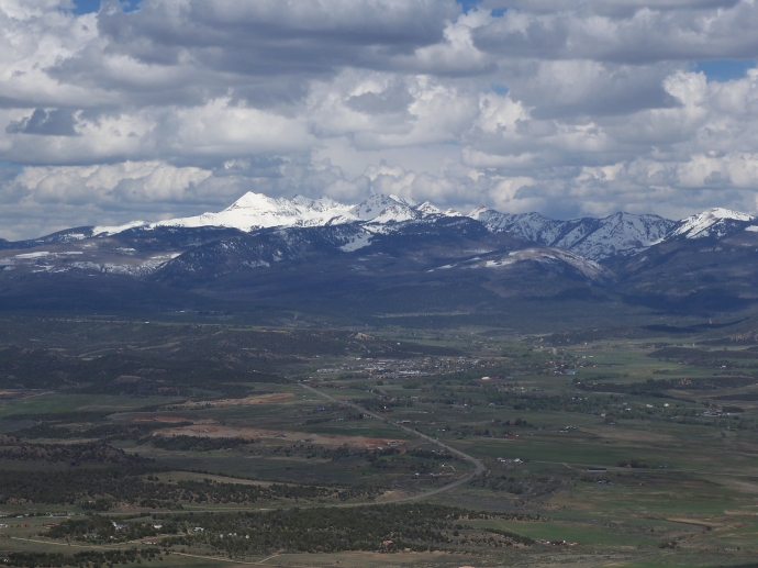 A view of some giant mountains during our descent from Mesa Verde National Park. If you look close enough you can see a city below the mountains.
 By: Neal Grosskopf
 At: 6:51:02 PM 6/5/2011